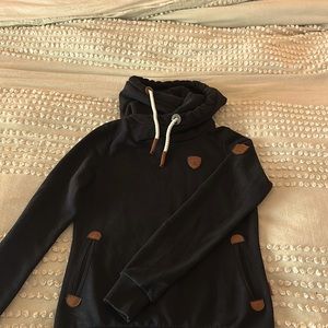 Wanakome black hoodie. Two front pockets, leathers tabs, worn only a few times.